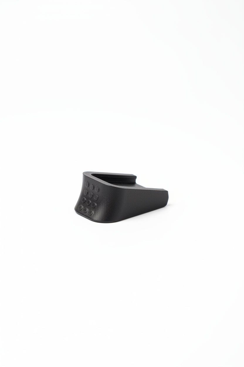 Replacement baseplate fitted to a Glock-style airsoft magazine