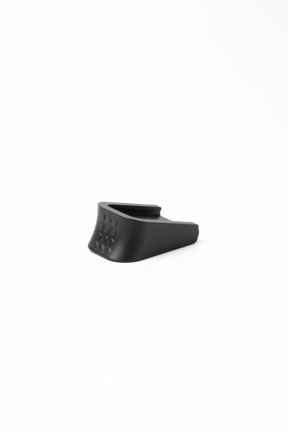 Replacement baseplate fitted to a Glock-style airsoft magazine