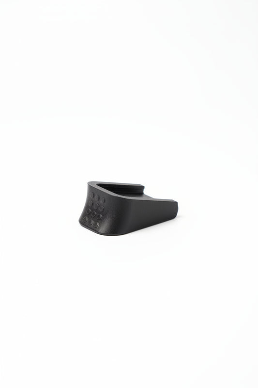Replacement baseplate fitted to a Glock-style airsoft magazine